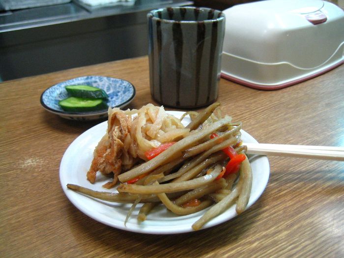 A Japanese appetizer, kinpira gobō, consisting of sauteed gobō (Greater burdock root) and carrot, with a side of sautéed dried daikon By ayustety from Tokyo, Japan - ?????, CC BY-SA 2.0, https://commons.wikimedia.org/w/index.php?curid=3696132
